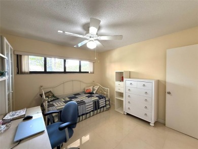 Rarely available, 3 bed/2 bath corner villa on a beautiful on Jacaranda Golf Club in Florida - for sale on GolfHomes.com, golf home, golf lot