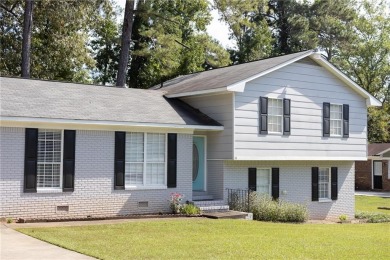 Welcome to this well-maintained brick home in a highly desirable on Lakewood Golf Course in Alabama - for sale on GolfHomes.com, golf home, golf lot