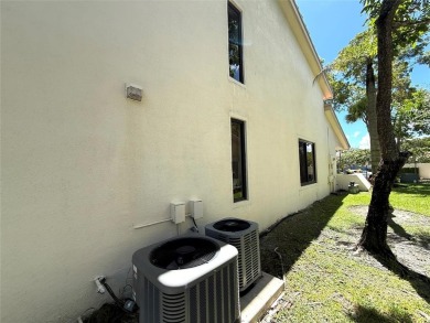 Rarely available, 3 bed/2 bath corner villa on a beautiful on Jacaranda Golf Club in Florida - for sale on GolfHomes.com, golf home, golf lot