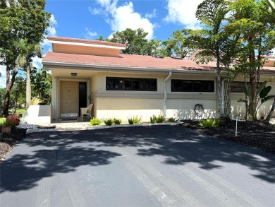 Rarely available, 3 bed/2 bath corner villa on a beautiful on Jacaranda Golf Club in Florida - for sale on GolfHomes.com, golf home, golf lot