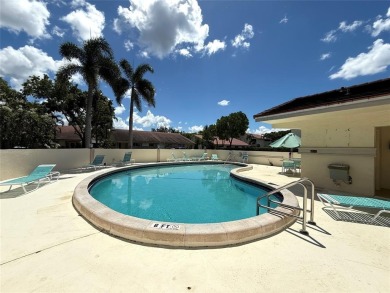Rarely available, 3 bed/2 bath corner villa on a beautiful on Jacaranda Golf Club in Florida - for sale on GolfHomes.com, golf home, golf lot
