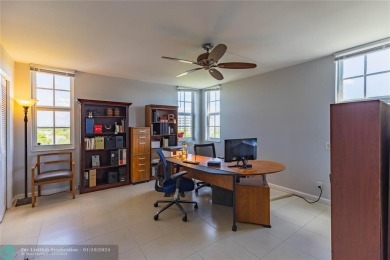 This spacious 1500 square foot corner unit is the one you have on Palm-Aire Country Club and Resort - Palms in Florida - for sale on GolfHomes.com, golf home, golf lot