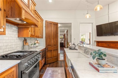 Step into a world of timeless luxury in the heart of Candler on Candler Park Golf Course in Georgia - for sale on GolfHomes.com, golf home, golf lot