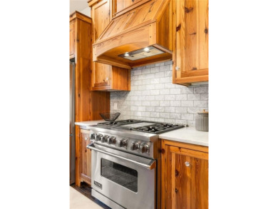 Step into a world of timeless luxury in the heart of Candler on Candler Park Golf Course in Georgia - for sale on GolfHomes.com, golf home, golf lot