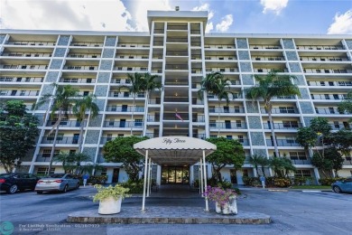 This spacious 1500 square foot corner unit is the one you have on Palm-Aire Country Club and Resort - Palms in Florida - for sale on GolfHomes.com, golf home, golf lot