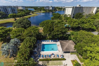 This spacious 1500 square foot corner unit is the one you have on Palm-Aire Country Club and Resort - Palms in Florida - for sale on GolfHomes.com, golf home, golf lot