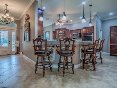 BREATHTAKING WATER VIEW on this EXPANDED 3BD/2BA GARDENIA on The Links of Spruce Creek in Florida - for sale on GolfHomes.com, golf home, golf lot