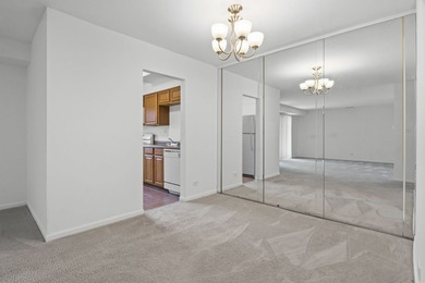 TERRIFFIC 2 BEDROOM 2 BATH FIRST FLOOR CORNER UNIT WITH PRIVATE on Twin Lakes Golf Course in Illinois - for sale on GolfHomes.com, golf home, golf lot