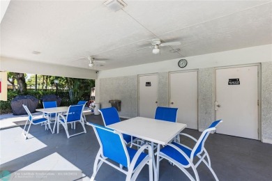 This spacious 1500 square foot corner unit is the one you have on Palm-Aire Country Club and Resort - Palms in Florida - for sale on GolfHomes.com, golf home, golf lot