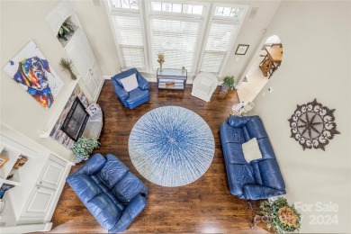 Located on a picturesque, park-like lot, this beautiful custom on Westport Golf Club in North Carolina - for sale on GolfHomes.com, golf home, golf lot