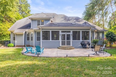 Located on a picturesque, park-like lot, this beautiful custom on Westport Golf Club in North Carolina - for sale on GolfHomes.com, golf home, golf lot