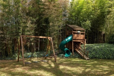 Step into a world of timeless luxury in the heart of Candler on Candler Park Golf Course in Georgia - for sale on GolfHomes.com, golf home, golf lot