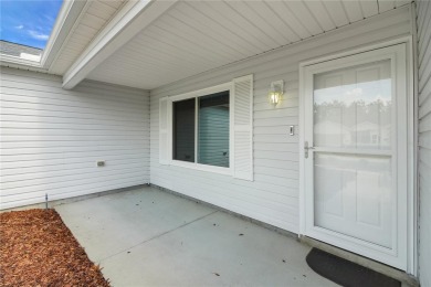 UPGRADES abound on this lovely BOND PAID  3-bed, 2-bath AMARILLO on The Links of Spruce Creek in Florida - for sale on GolfHomes.com, golf home, golf lot