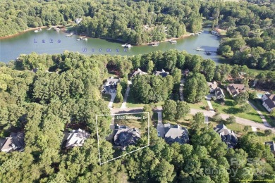 Located on a picturesque, park-like lot, this beautiful custom on Westport Golf Club in North Carolina - for sale on GolfHomes.com, golf home, golf lot