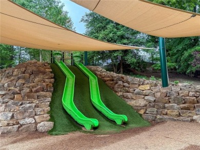 Step into a world of timeless luxury in the heart of Candler on Candler Park Golf Course in Georgia - for sale on GolfHomes.com, golf home, golf lot
