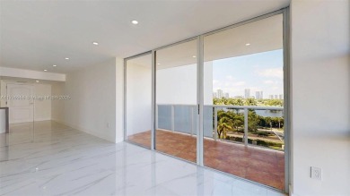 Enjoy breathtaking panoramic views from this beautifully on Turnberry Isle Resort and Club in Florida - for sale on GolfHomes.com, golf home, golf lot