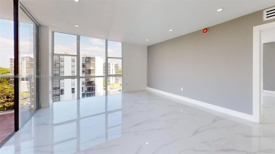 Enjoy breathtaking panoramic views from this beautifully on Turnberry Isle Resort and Club in Florida - for sale on GolfHomes.com, golf home, golf lot