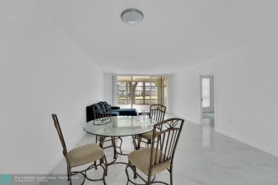 Beautifully updated 2 bed, 2 bath corner unit condo on the first on Colony West Country Club in Florida - for sale on GolfHomes.com, golf home, golf lot