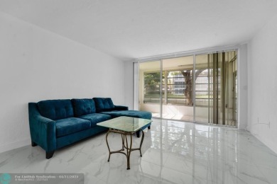 Beautifully updated 2 bed, 2 bath corner unit condo on the first on Colony West Country Club in Florida - for sale on GolfHomes.com, golf home, golf lot