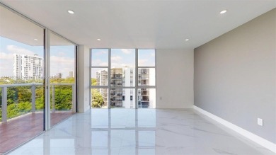 Enjoy breathtaking panoramic views from this beautifully on Turnberry Isle Resort and Club in Florida - for sale on GolfHomes.com, golf home, golf lot
