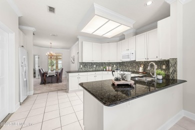 This LAKEFRONT HOME in CYPRESS VILLAGE is perfect for those on Windsor Parke Golf Club in Florida - for sale on GolfHomes.com, golf home, golf lot
