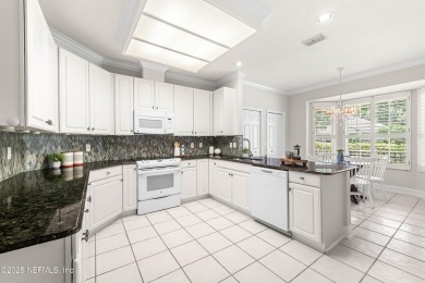 This LAKEFRONT HOME in CYPRESS VILLAGE is perfect for those on Windsor Parke Golf Club in Florida - for sale on GolfHomes.com, golf home, golf lot