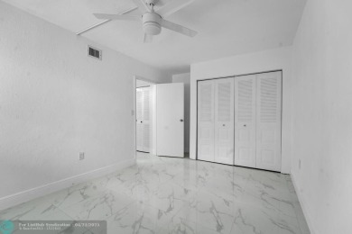 Beautifully updated 2 bed, 2 bath corner unit condo on the first on Colony West Country Club in Florida - for sale on GolfHomes.com, golf home, golf lot