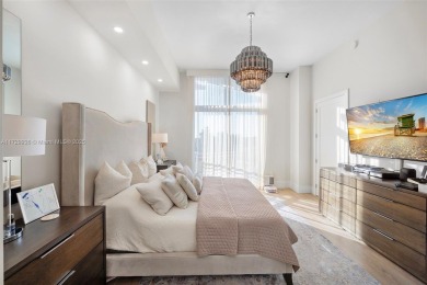 Meridian Lofts Residence #411 is a sleek 2-bed, 2.5-bath on Miami Beach Golf Club in Florida - for sale on GolfHomes.com, golf home, golf lot