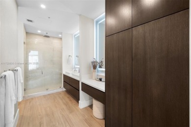 Meridian Lofts Residence #411 is a sleek 2-bed, 2.5-bath on Miami Beach Golf Club in Florida - for sale on GolfHomes.com, golf home, golf lot