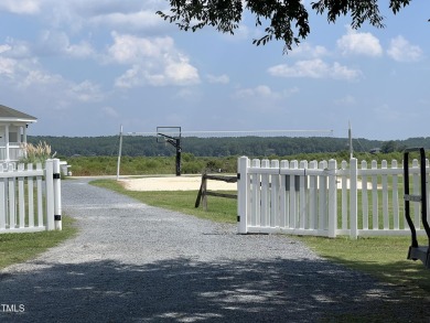 This .51 acres is located in the gated Woodlake Country Club on Woodlake Country Club in North Carolina - for sale on GolfHomes.com, golf home, golf lot