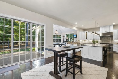 Welcome to an extraordinary home tucked away on a quiet on Hasentree Club in North Carolina - for sale on GolfHomes.com, golf home, golf lot