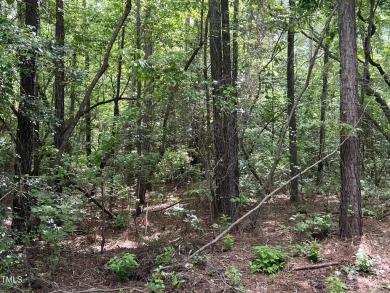 This .51 acres is located in the gated Woodlake Country Club on Woodlake Country Club in North Carolina - for sale on GolfHomes.com, golf home, golf lot