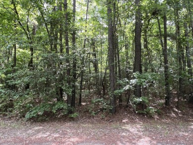 This .51 acres is located in the gated Woodlake Country Club on Woodlake Country Club in North Carolina - for sale on GolfHomes.com, golf home, golf lot