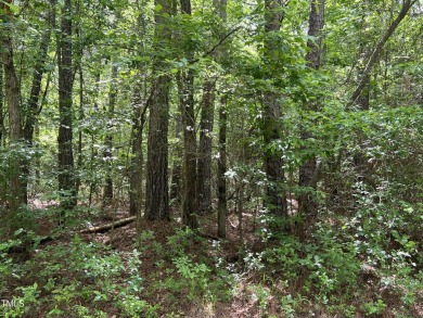 This .51 acres is located in the gated Woodlake Country Club on Woodlake Country Club in North Carolina - for sale on GolfHomes.com, golf home, golf lot