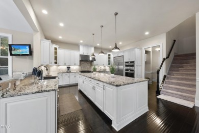Welcome to an extraordinary home tucked away on a quiet on Hasentree Club in North Carolina - for sale on GolfHomes.com, golf home, golf lot