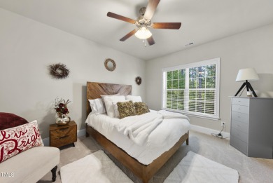 Welcome to an extraordinary home tucked away on a quiet on Hasentree Club in North Carolina - for sale on GolfHomes.com, golf home, golf lot