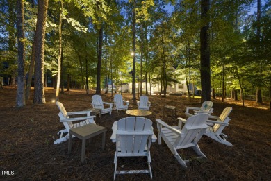 Welcome to an extraordinary home tucked away on a quiet on Hasentree Club in North Carolina - for sale on GolfHomes.com, golf home, golf lot
