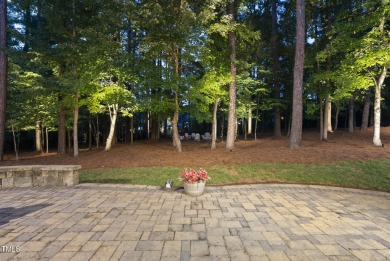 Welcome to an extraordinary home tucked away on a quiet on Hasentree Club in North Carolina - for sale on GolfHomes.com, golf home, golf lot
