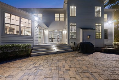 Welcome to an extraordinary home tucked away on a quiet on Hasentree Club in North Carolina - for sale on GolfHomes.com, golf home, golf lot