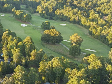 Welcome to an extraordinary home tucked away on a quiet on Hasentree Club in North Carolina - for sale on GolfHomes.com, golf home, golf lot