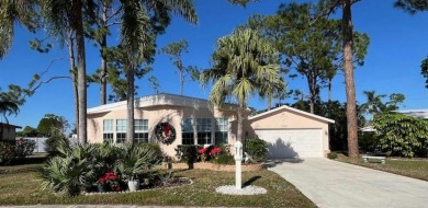 Immaculate 2-bd 2-ba Stucco home with a lovely golf course view on Del Tura Golf and Country Club in Florida - for sale on GolfHomes.com, golf home, golf lot
