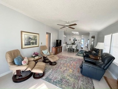 Immaculate 2-bd 2-ba Stucco home with a lovely golf course view on Del Tura Golf and Country Club in Florida - for sale on GolfHomes.com, golf home, golf lot