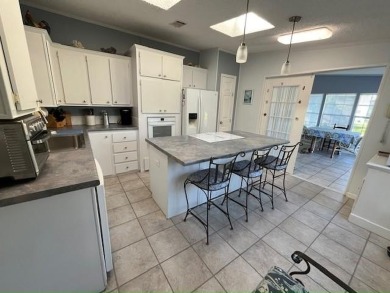 Immaculate 2-bd 2-ba Stucco home with a lovely golf course view on Del Tura Golf and Country Club in Florida - for sale on GolfHomes.com, golf home, golf lot