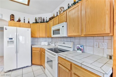 Located on the golf course, boasting breathtaking views of the on Mojave Resort Golf Club in Nevada - for sale on GolfHomes.com, golf home, golf lot
