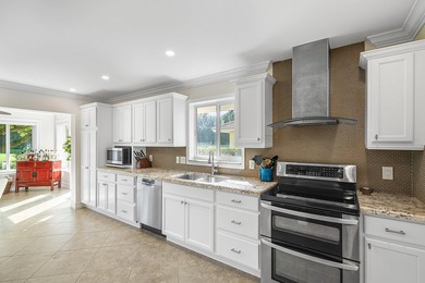 Inviting 3-Bedroom Home with Golf & Lake Views in beautiful on Quail Ridge Golf Course and Country Club in Florida - for sale on GolfHomes.com, golf home, golf lot