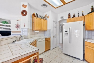 Located on the golf course, boasting breathtaking views of the on Mojave Resort Golf Club in Nevada - for sale on GolfHomes.com, golf home, golf lot