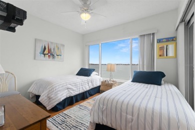 Live the Florida dream in your new move-in ready corner unit on Isla Del Sol Yacht and Country Club in Florida - for sale on GolfHomes.com, golf home, golf lot