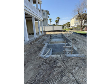 Welcome to luxury coastal living at its finest. Located in the on Surf Golf and Beach Club in South Carolina - for sale on GolfHomes.com, golf home, golf lot