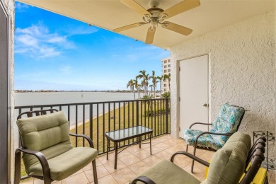 Live the Florida dream in your new move-in ready corner unit on Isla Del Sol Yacht and Country Club in Florida - for sale on GolfHomes.com, golf home, golf lot