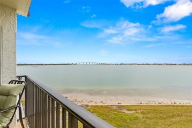 Live the Florida dream in your new move-in ready corner unit on Isla Del Sol Yacht and Country Club in Florida - for sale on GolfHomes.com, golf home, golf lot